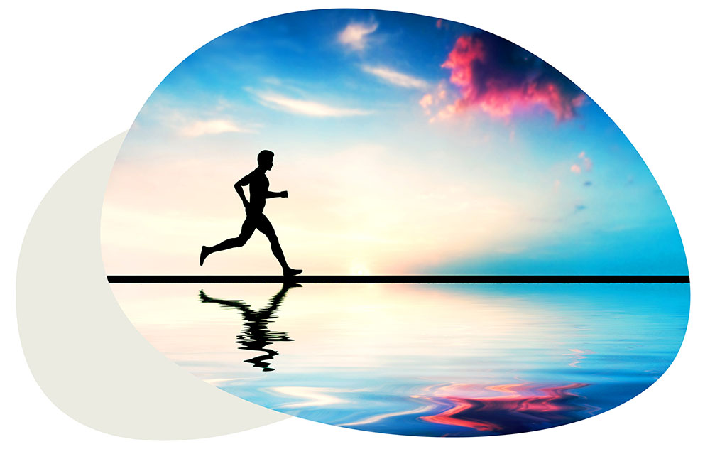 Image of man running on beach