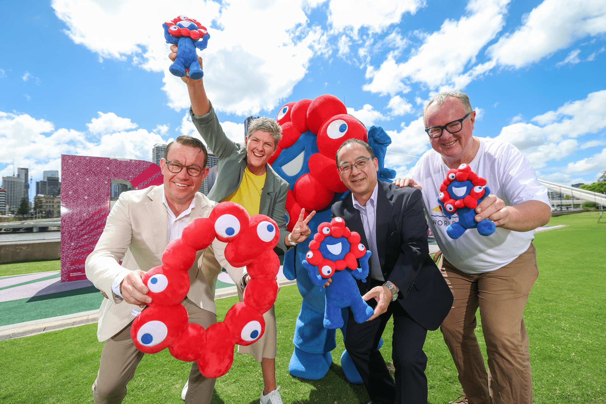 Minister Bates, Japan Consul General Brisbane Ishikawa Katsutoshi, Trade and Investment Queensland CEO Justin McGowan and Olympic gold medallist Natalie Cook at South Bank with World Expo 2025 Osaka mascot MYAKU-MYAKU