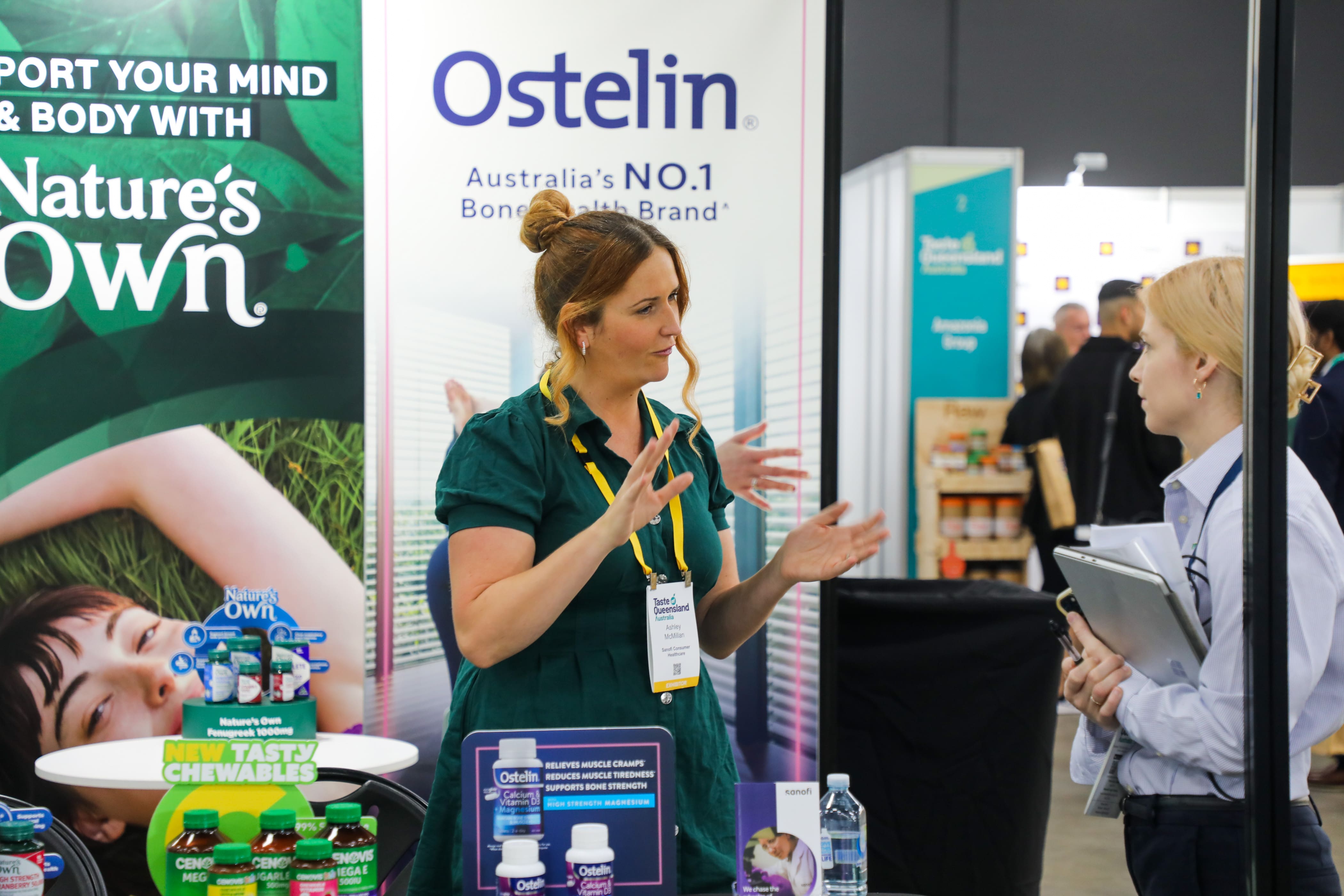 A Trade and Investment Queensland Staff member speaking with an exporter.