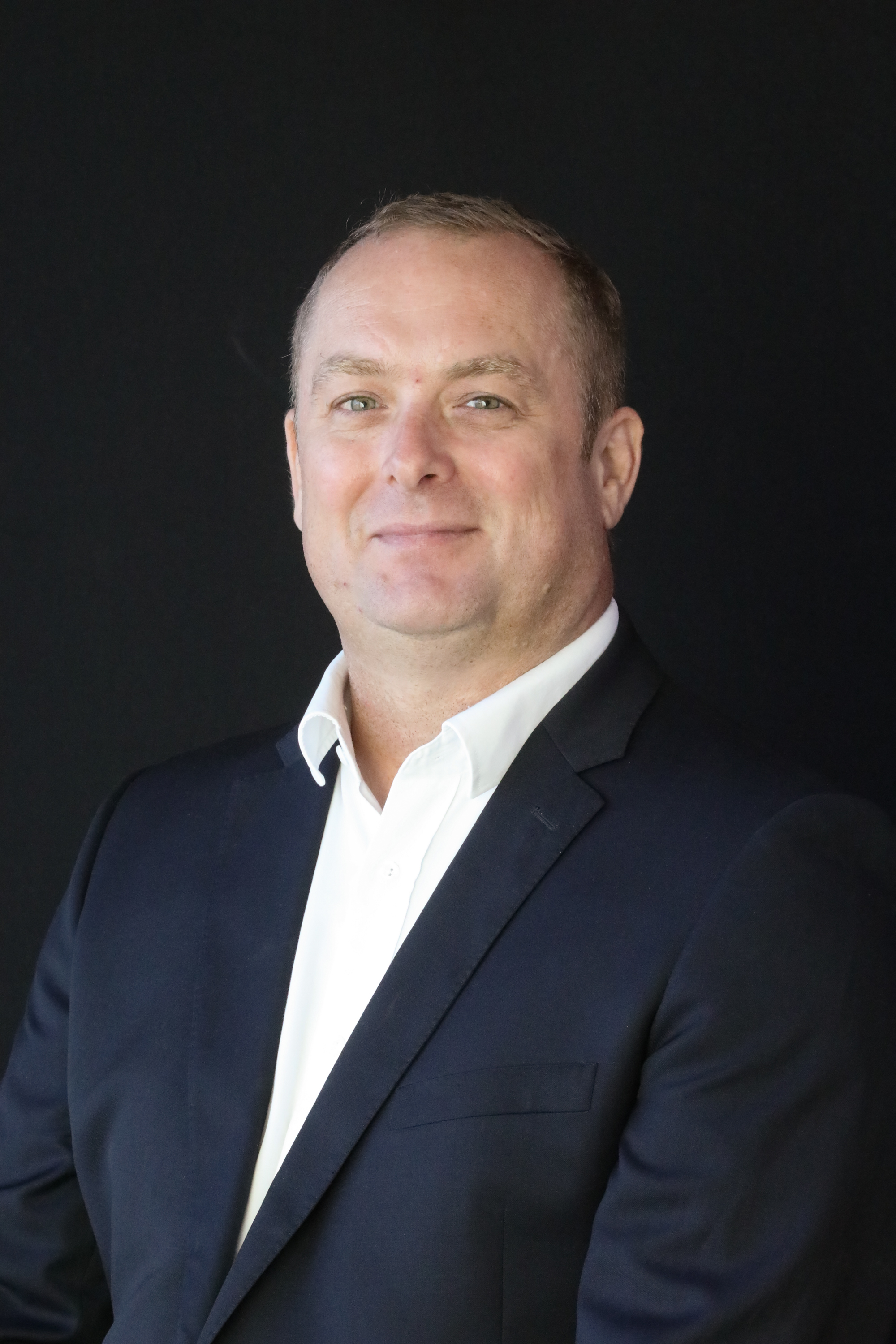 Headshot of Ryan Beers, Principal Trade and Investment Officer.