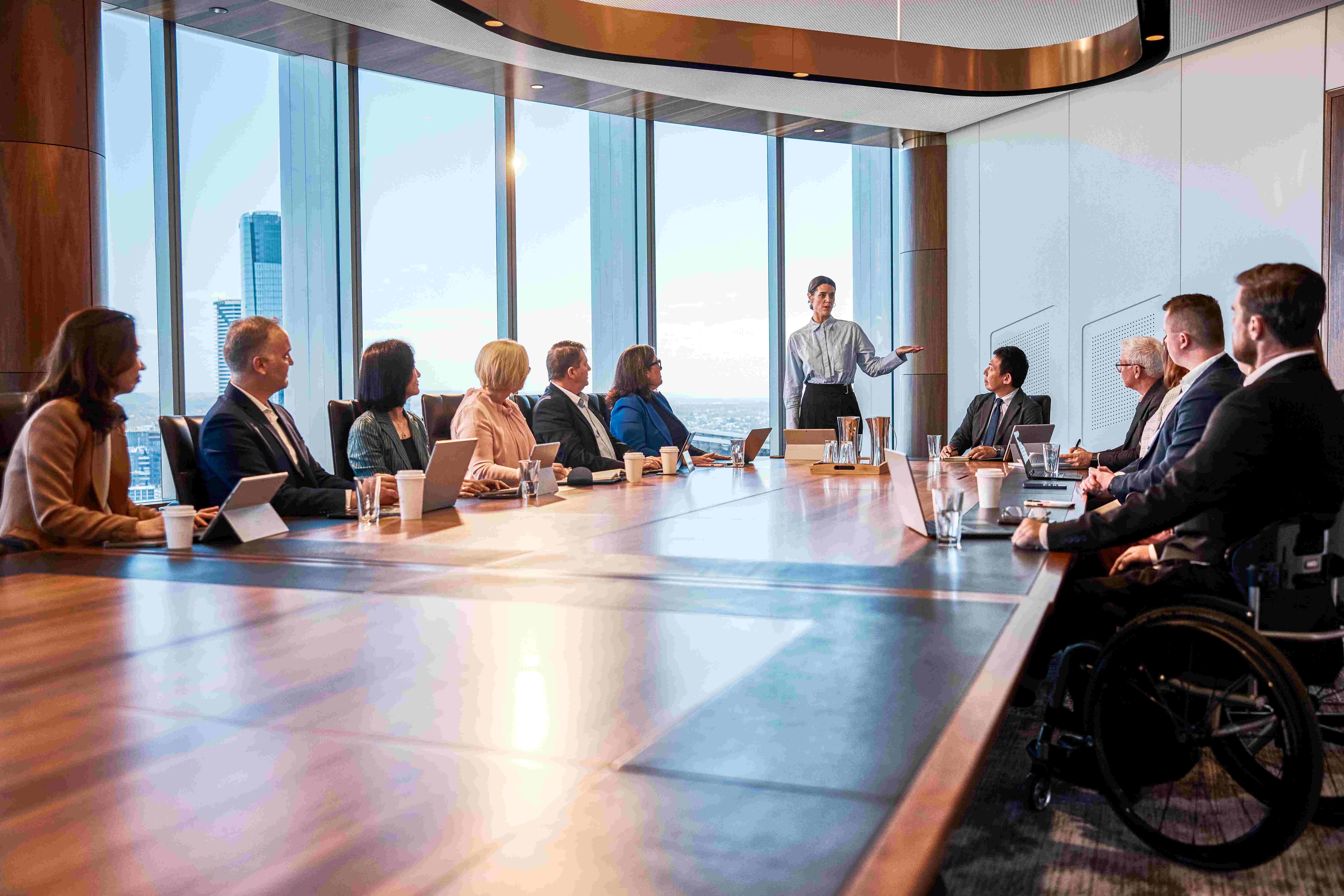 People having a meeting in a board room